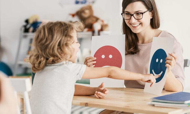 ABA instructor with a child